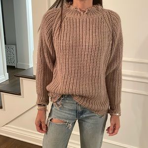 Blush color sweater fits like a medium